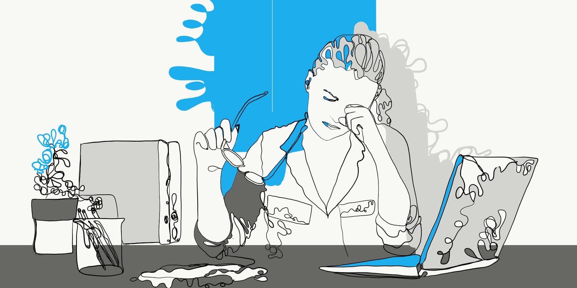 Donna-seduta-alla-scrivania-con-un-pc Burnuout